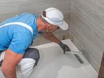 How to Fix a Cracked Shower Base <span>Without</span> Removing Tiles
