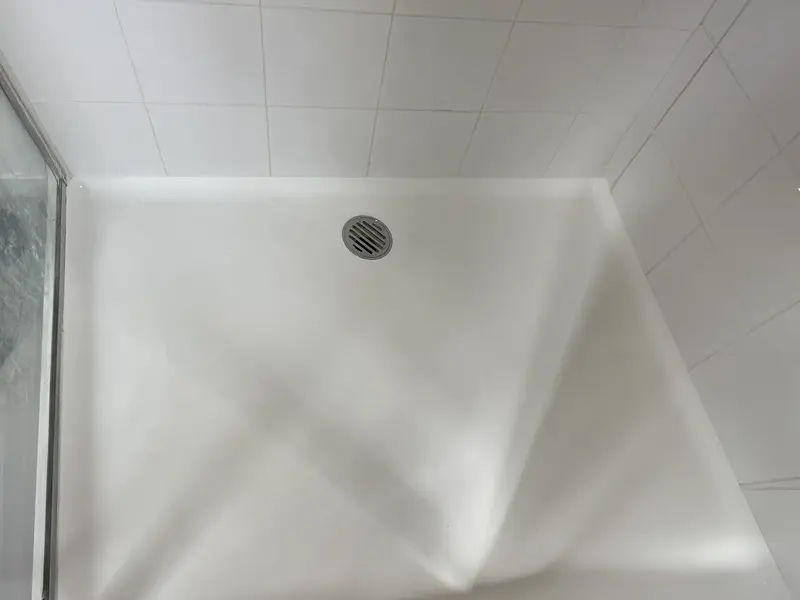 Repaired shower base looking brand new